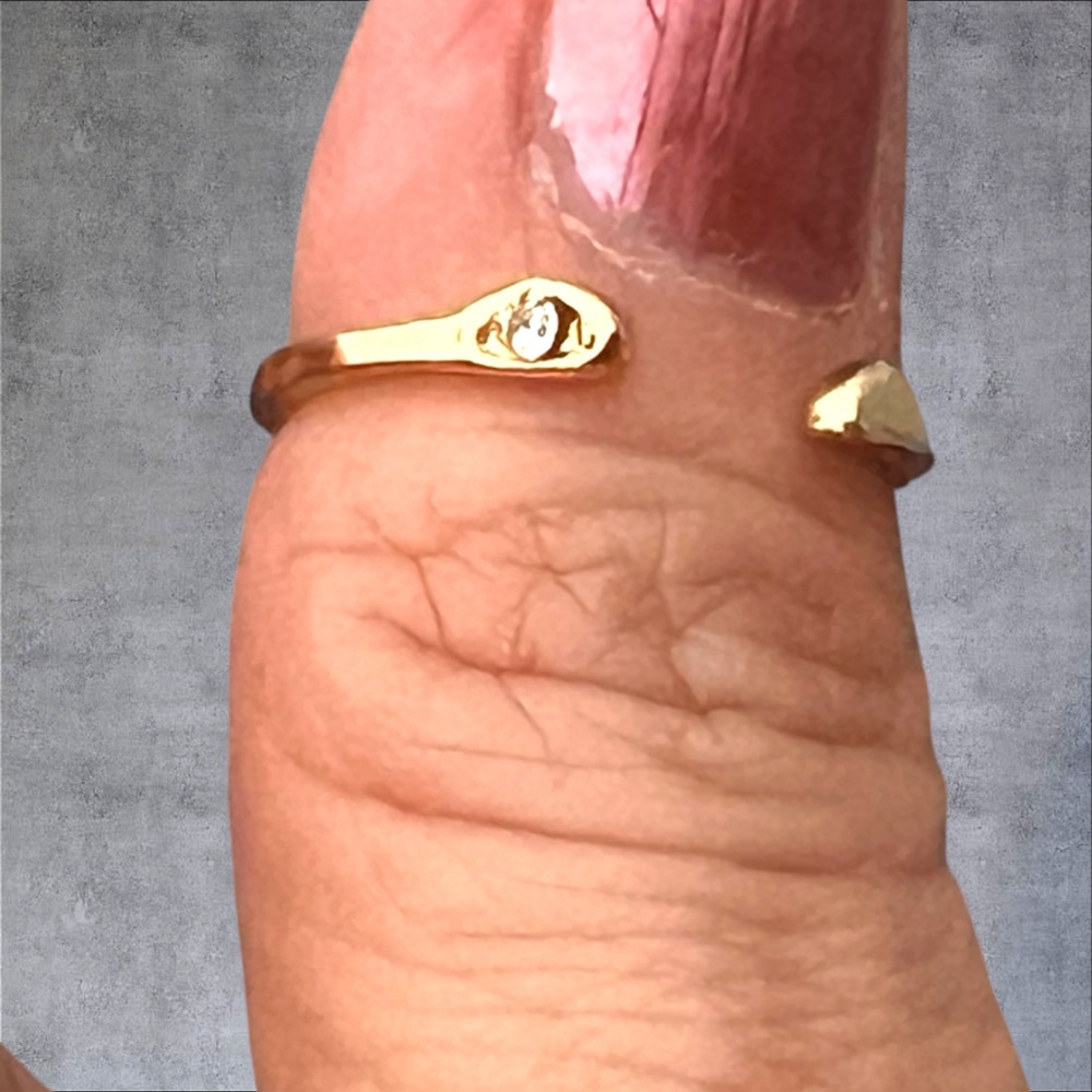 Gold plated ring adjustable size tiny clear stone